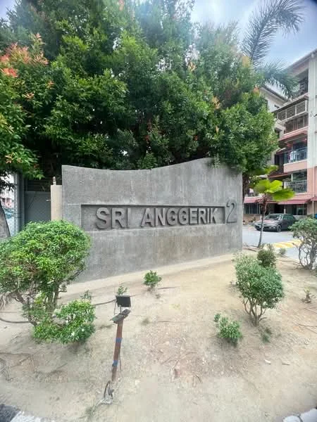 Exterior features: concrete signage, landscaped garden, bushes, palm trees, residential building in background, paved walkway; style: modern.