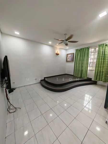 Living features: white painted walls, glossy white tile flooring, 5-blade ceiling fan with light, large window with green curtains, TV mounted on wall, step-up platform, decorative wall sconce, corner artwork; style: modern.