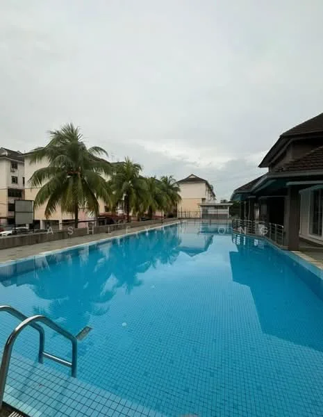 Exterior type: swimming pool deck; features: infinity pool, tiled pool surface, surrounded by palm trees, pool deck with loungers, residential buildings in background, cloudy sky; style: modern.