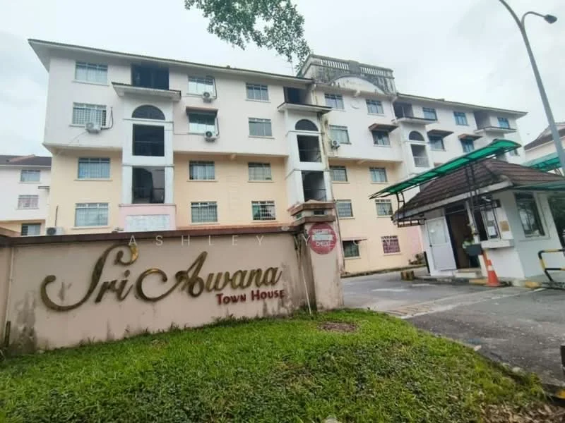Exterior type: townhouse; features: 3-storey building, cream painted facade, balconies on upper floors, visible air conditioning units, landscaped grass area in front, entrance gate with security, covered entrance, parking area visible; style: modern.