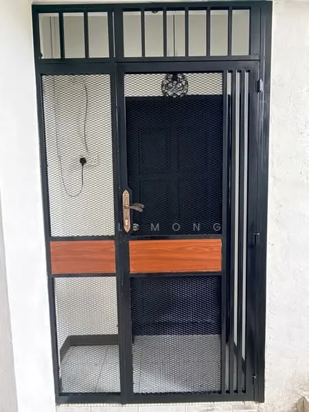 Exterior features: metal security door with mesh, wooden panel insert, black frame, door handle, intercom system, tiled flooring, light fixture above door; style: modern.