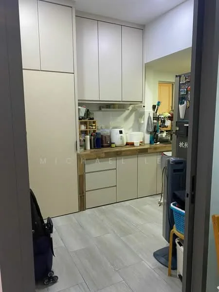 Kitchen features: light-colored cabinetry, wood countertop, built-in oven, microwave, stainless-steel kettle, blender, various kitchen utensils, open shelving, refrigerator, floor tiles in light grey, wall-mounted storage, sink, dish rack; style: modern.