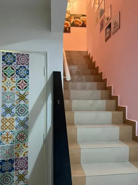 Room features: staircase with beige tiles, decorative wall tiles with colorful patterns, white painted walls, handrail, wall-mounted light fixture, framed artwork on wall; style: modern.