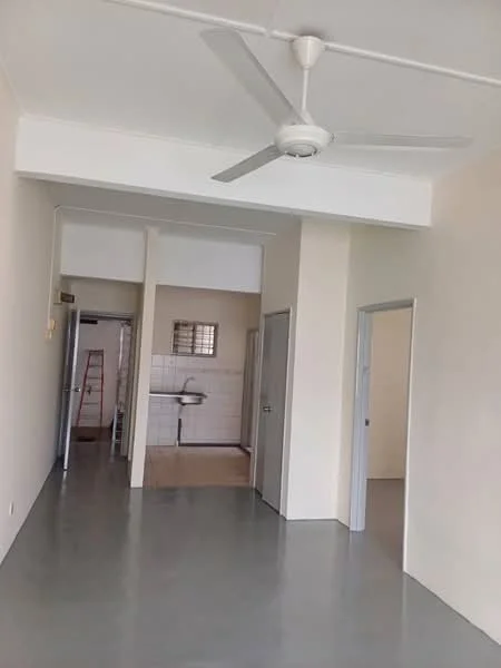 Room features: white painted walls, grey polished concrete flooring, 5-blade ceiling fan, doorway leading to another room, doorway leading to kitchen area, window with natural light, neutral color scheme; style: minimalist.
