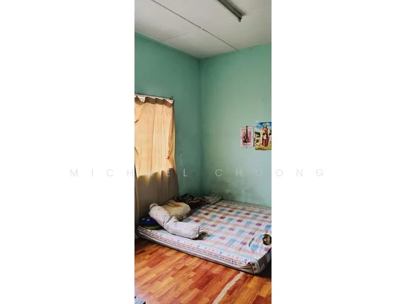 Bedroom features: green painted walls, wooden flooring, single mattress on bed frame, curtains on window, posters on wall, ceiling lights, floor space with no furniture.