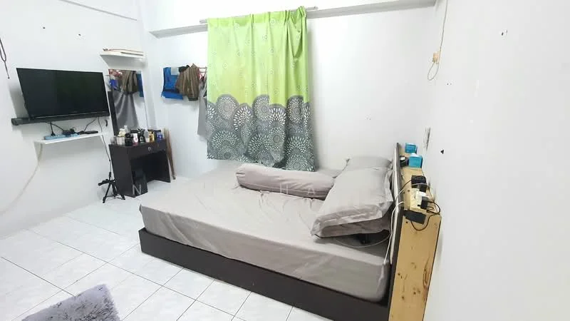 Bedroom features: queen-size bed with grey bedding, wooden bed frame, green patterned curtains, wall-mounted TV, dark wood bedside table, white tiled flooring, exposed air conditioning unit, wooden nightstand with power outlets, decorative wall art, light-colored wall paint; style: minimalist.