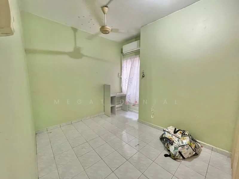 Room features: green painted walls, white tiled flooring, ceiling fan, window with sheer curtains, built-in desk, air conditioning unit, empty space, bag on the floor.