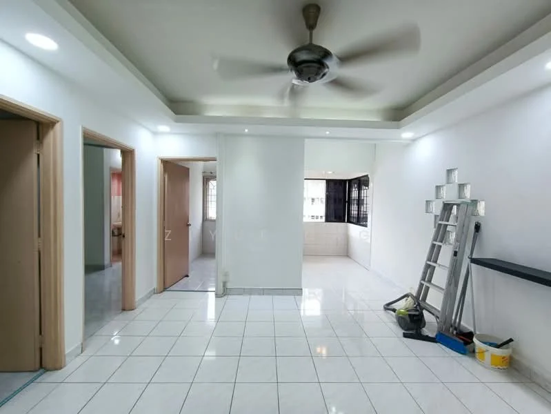 Room features: white painted walls, glossy white tile flooring, tray ceiling with recessed lighting, 5-blade ceiling fan, wooden door frames, sliding glass door to kitchen area, ladder, vacuum cleaner, open layout, natural light from windows; style: modern.