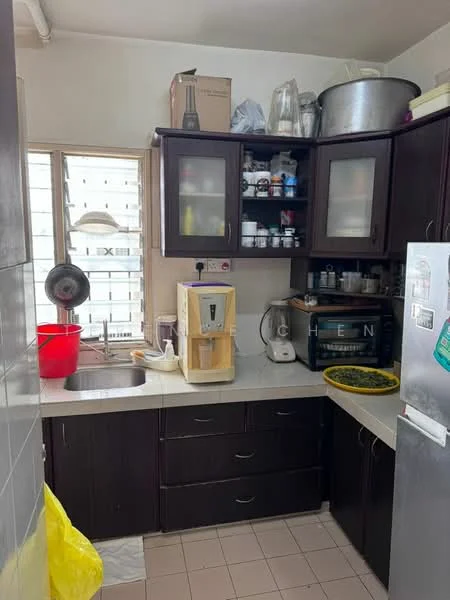 Kitchen features: dark wood cabinetry, white countertop, single-bowl stainless-steel sink, chrome faucet, built-in refrigerator, microwave, countertop water dispenser, open shelving, tile flooring, window with metal grille, kitchen appliances visible, yellow plastic bag, cooking utensils on countertop.