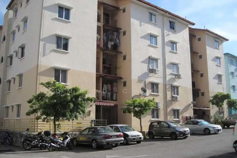 Exterior type: low-rise apartment block; features: cream painted facade, multiple storeys, balconies with railings, air conditioning units visible, parking area with cars, surrounded by trees, sidewalk, street view; style: modern.