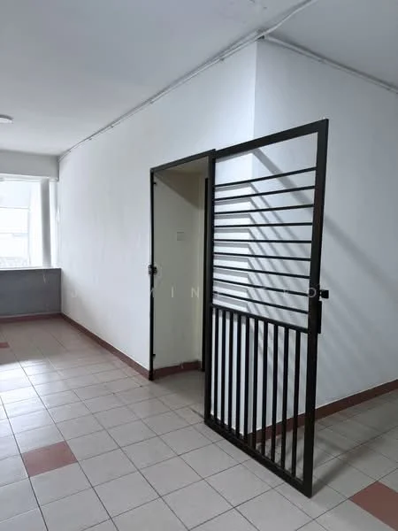 Room features: white painted walls, tile flooring with red accents, metal security gate, large window providing natural light, corner location, open space layout; style: modern.
