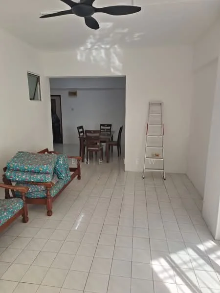 Living features: white painted walls, white tiled flooring, 5-blade ceiling fan, wooden sofa set with cushions, ladder, dining table with chairs, natural light from window, open layout.