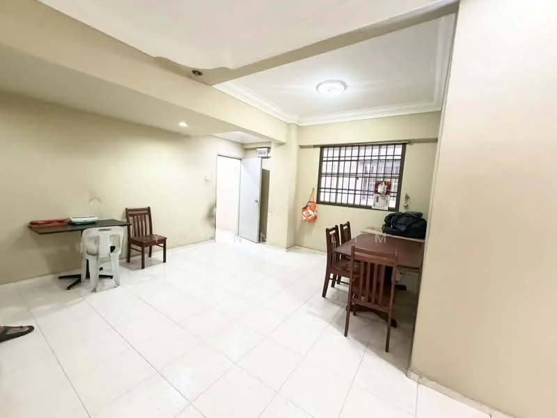 Room features: white painted walls, tile flooring, ceiling with recessed lighting, window with security bars, dining table with four wooden chairs, plastic chair, door leading to another room, light fixture on ceiling.