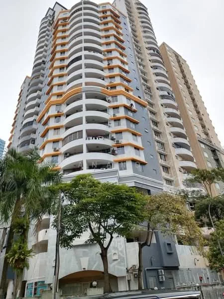 Exterior type: high-rise condominium; features: grey painted facade, orange accent balconies, recessed balconies, glass curtain wall, multiple storeys, surrounded by trees, parking area at the base; style: modern.
