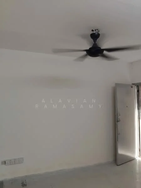 Room features: white painted walls, ceiling fan, door, concrete flooring.
