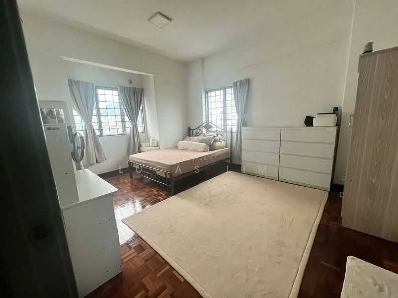 Bedroom features: wooden flooring, white painted walls, floor-to-ceiling windows, curtains, queen-size bed, upholstered headboard, built-in wardrobe, dressing table, area rug; style: minimalist.