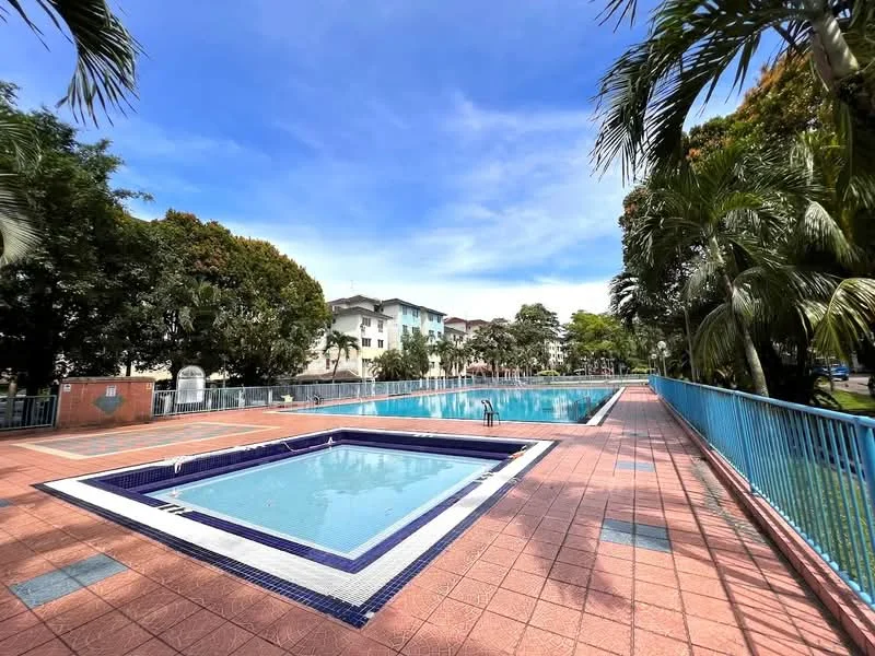 Exterior type: swimming pool deck; features: infinity pool, jacuzzi, pool deck with loungers, surrounded by palm trees, manicured landscaping, blue railings, tiled pool edges, sunny weather, clear blue sky; style: modern.