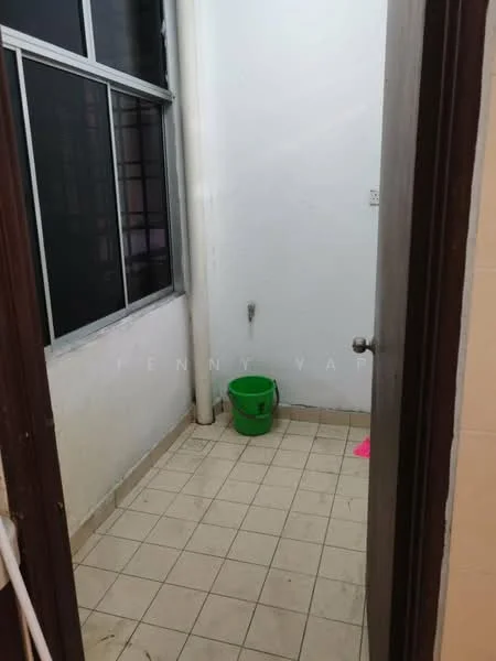 Room features: white painted walls, tile flooring, single window, green plastic bucket, pink mat, corner space.