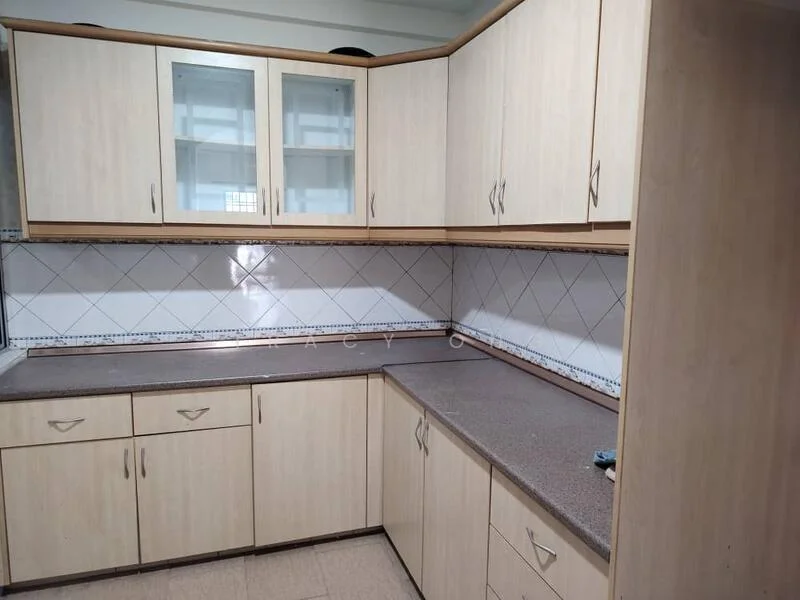 Kitchen features: laminate cabinetry in light wood finish, grey countertop, white tiled backsplash, double-basin stainless-steel sink, chrome faucet, built-in upper cabinets with glass fronts, lower cabinets with handles, tile flooring, corner cabinet, counter space along walls; style: modern.