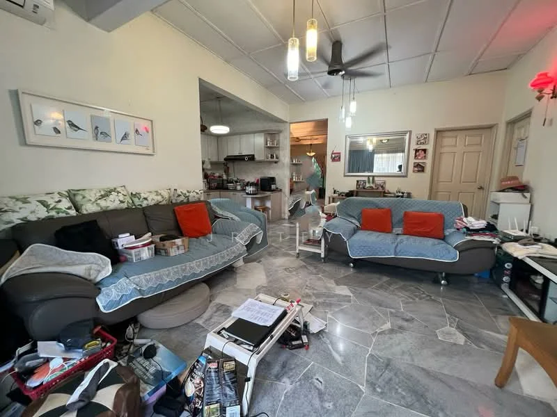 Living features: grey leather sofa with blue throw blankets, orange accent cushions, marble tile flooring, ceiling fan with light, recessed ceiling lights, decorative wall art, coffee table, side table, wall-mounted mirror, various items on the floor, open layout to kitchen, light-colored walls; style: modern.