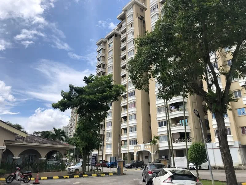 Exterior type: mid-rise condominium; features: cream painted facade, balconies on upper floors, landscaped garden area, manicured lawn, trees surrounding the building, parking area with marked spaces, multiple storeys, entrance with awning; style: modern.