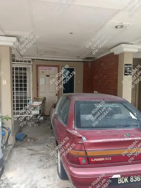 Exterior type: linked terrace house; features: car porch with awning, brick facade, front door with security grille, concrete flooring, exposed brick wall, single-storey, visible car parked; style: traditional.