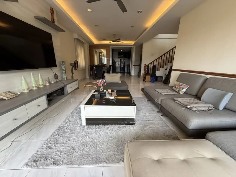 Living features: grey sectional sofa, 2-seater fabric sofa, coffee table with black top, area rug with fluffy texture, wall-mounted TV, entertainment unit with storage, ceiling fan, recessed LED downlights, decorative sculpture on shelf, large windows with sheer curtains, wooden staircase in background, open layout to kitchen, decorative wall art, potted plants; style: modern.