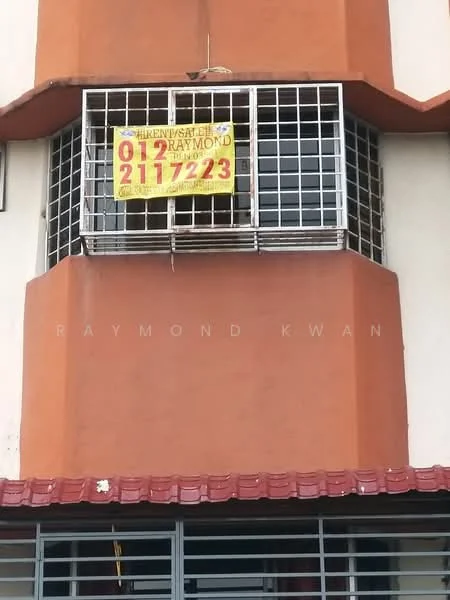 Exterior features: orange painted facade, metal window grille, signboard with contact information, red awning, multi-storey building.