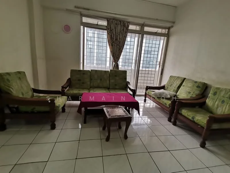 Living features: green patterned fabric sofa set, wooden frame for sofa, coffee table, white tiled flooring, floor-to-ceiling windows, curtains, wall-mounted decorative item, natural light from windows; view: city.