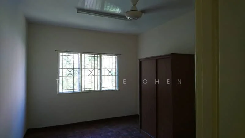 Room features: white painted walls, ceiling fan, window with security bars, wooden wardrobe, brown tiled flooring.