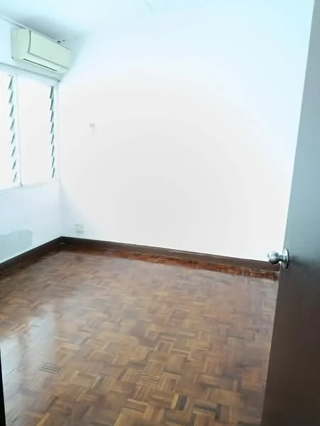 Room features: wooden flooring, white painted walls, 1 wall-mounted split AC, window with horizontal slats, door with knob.