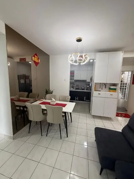 Dining features: 6-seater dining table with white tabletop, upholstered dining chairs in beige, pendant light fixture with multiple bulbs, mirror wall, white cabinetry with storage, tile flooring, open layout to kitchen, decorative red wall hanging; style: modern. Kitchen features: white cabinetry, built-in sink, countertop with storage, stainless-steel refrigerator visible in background; style: modern.