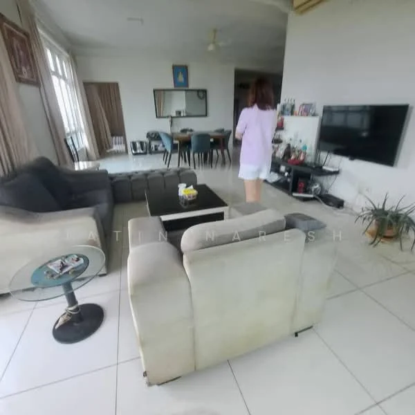 Living features: 3-seater fabric sofa in grey, 2-seater fabric sofa in light beige, glass coffee table, wall-mounted TV, TV console, area rug, floor-to-ceiling windows, curtains, ceiling fan, decorative plants, wall art, dining area visible in background; style: modern.