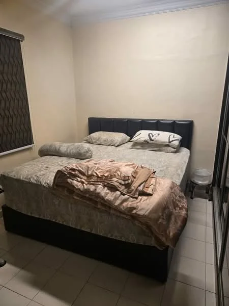 Bedroom features: king-size bed, upholstered headboard, bedding with decorative pillows, nightstand with lamp, window with roller blinds, cream painted walls, tile flooring, ceiling with crown moulding; style: modern.