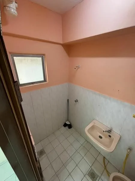 Room features: pink painted walls, white tiled walls, white tiled flooring, small window, sink, wall-mounted faucet, shower head, floor drain.