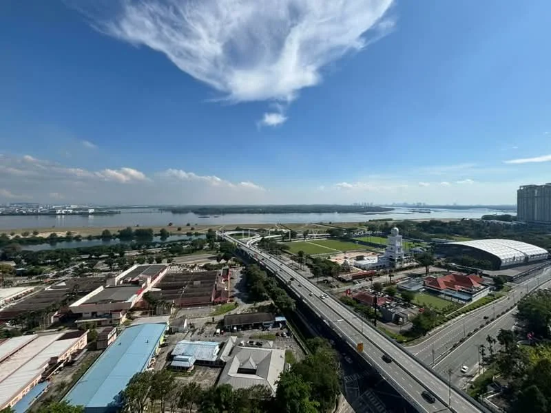 Exterior features: city skyline view, river view, highway visible, green park area, commercial buildings, sports facility, open sky, urban landscape; style: modern.