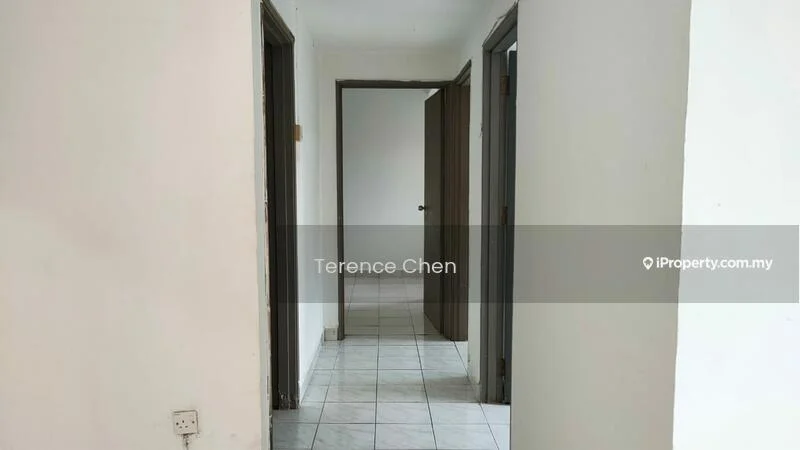 Room features: white painted walls, ceramic tile flooring, door frames, multiple doorways, neutral color scheme, light source from ceiling, plain ceiling, no visible decor.