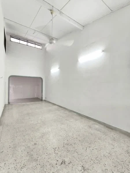 Room features: white painted walls, exposed ceiling with beams, concrete flooring, 2 wall-mounted light fixtures, 1 ceiling fan, large window for natural light, open layout; style: minimalist.