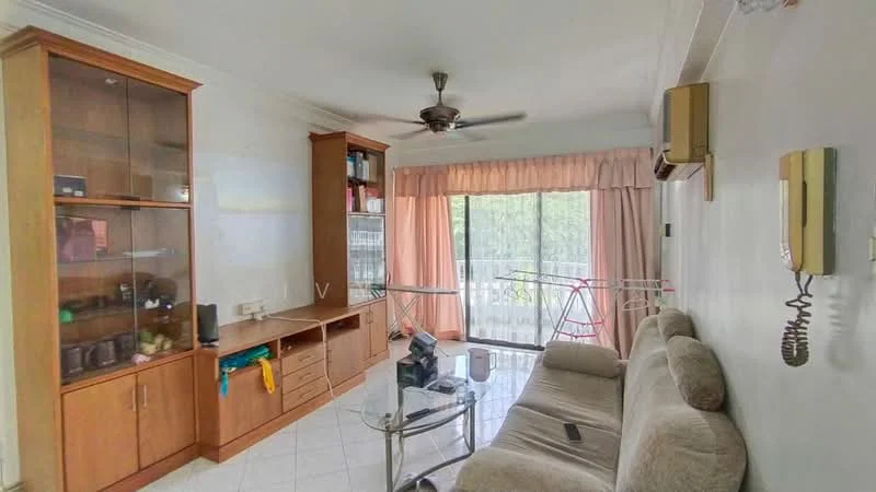 Living features: cream painted walls, white tiled flooring, 5-blade ceiling fan, sofa in beige fabric, glass coffee table, wooden display cabinet, built-in shelving, floor-to-ceiling windows, curtains in light pink, air conditioning unit, telephone wall mount, clothes drying rack; style: modern; view: garden.