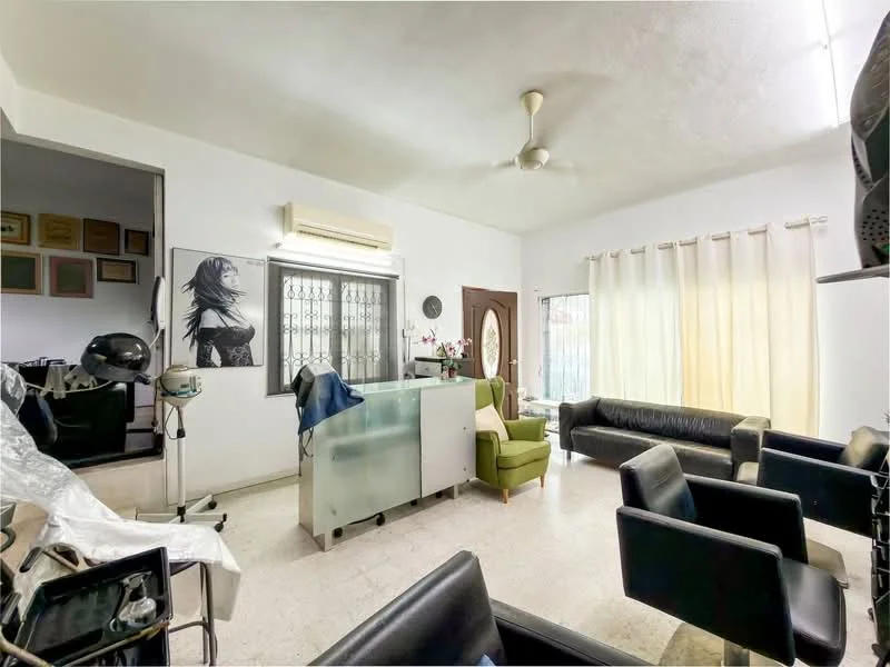 Living features: white painted walls, ceiling fan, large windows with sheer curtains, tile flooring, green armchair, black leather sofa, glass partition, reception desk, decorative wall art, air conditioning unit; style: modern.