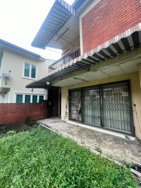 Exterior type: semi-detached house; features: red brick facade, concrete flooring, covered balcony, sliding glass doors, manicured lawn, overgrown grass, metal awning, two-storey structure; style: modern.