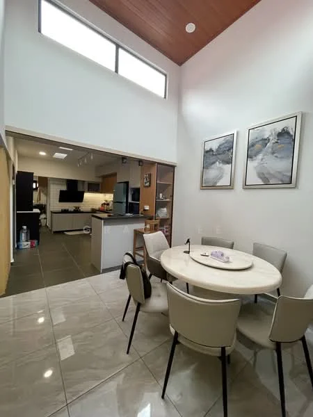 Dining features: round dining table, upholstered dining chairs, white marble tabletop, grey tiled flooring, wall-mounted artwork, high ceiling with wooden beams, large windows for natural light; style: modern. Kitchen features: open-plan layout, black cabinetry, stainless-steel appliances, kitchen island, grey tiled flooring; style: modern.