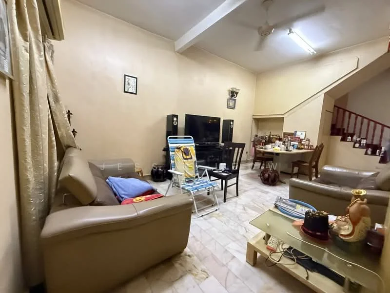 Living features: cream painted walls, marble flooring, 5-blade ceiling fan, sofa in beige, coffee table, TV console, wall-mounted TV, wooden dining table with chairs, decorative items on shelves, curtains, staircase in background; style: traditional.