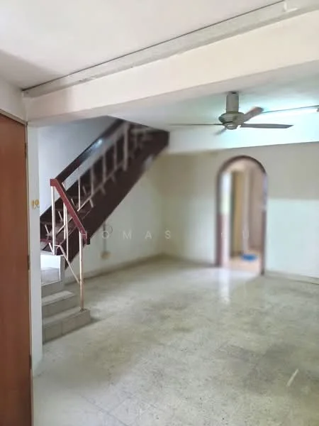 Living features: ceiling fan, staircase with wooden railing, plain white walls, tile flooring, arched doorway, natural light from windows, open layout, neutral color scheme.