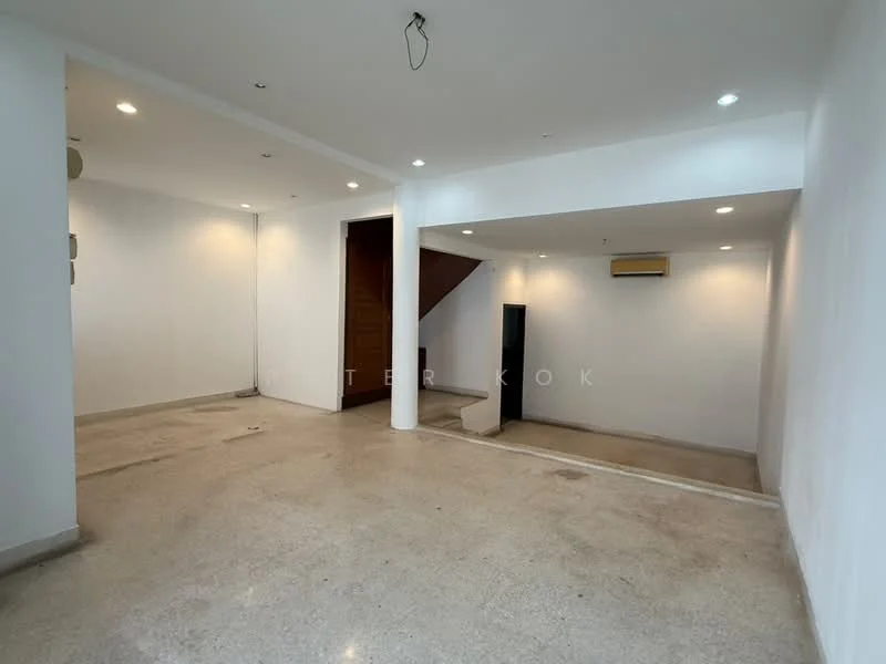Room features: white painted walls, polished concrete flooring, recessed downlights, 1 wall-mounted split AC, staircase leading to upper level, open layout, no visible furniture, neutral color scheme; style: modern.