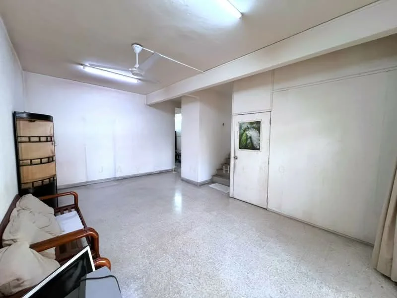 Living features: cream painted walls, polished concrete flooring, 5-blade ceiling fan, large window, wooden sofa, decorative wall art, door leading to another room, light fixtures on ceiling; style: minimalist.