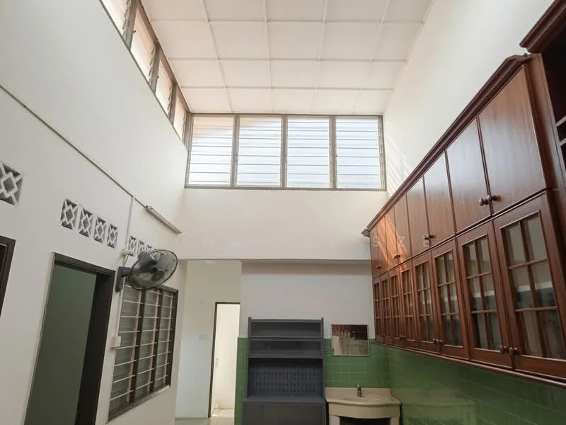 Room features: white painted walls, green tiled backsplash, wood cabinetry with glass doors, single-bowl sink, ceiling fan, high ceiling, large windows, tile flooring.