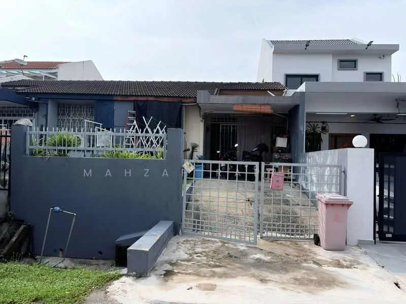 Exterior type: semi-detached house; features: grey painted facade, metal gate, paved driveway, manicured lawn, front porch, single-storey, fenced perimeter, outdoor seating area, decorative wall with lettering, visible windows, roof overhang; style: modern.
