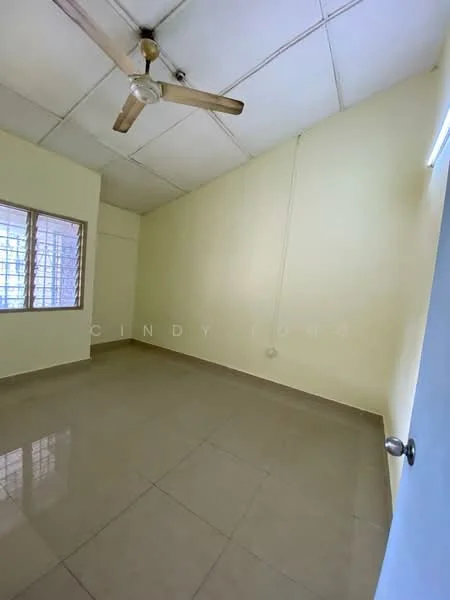 Room features: cream painted walls, white ceiling, ceiling fan, floor tiles, large window with metal grille, neutral flooring, light switch, door with knob; style: minimalist.