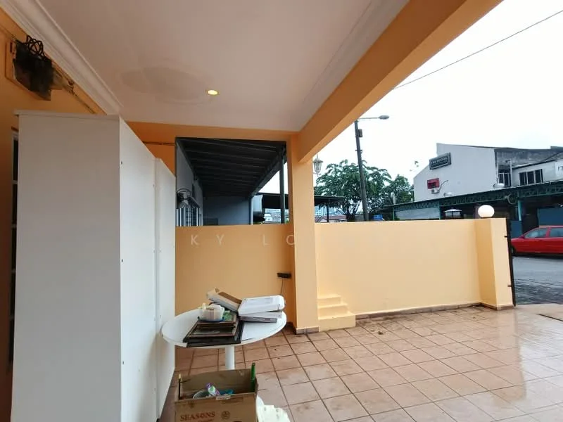 Exterior type: linked terrace house; features: yellow painted facade, tiled flooring, steps leading up, white wall, outdoor table, street view, overhead lighting, sidewalk, nearby parking; style: modern.